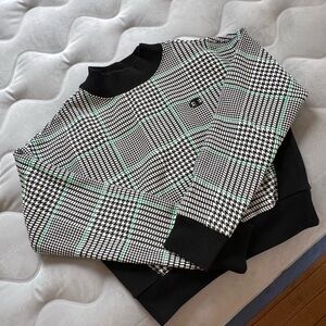 Champion Black and White Houndstooth Sweater with Green Accents